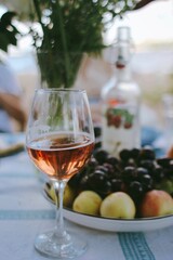 Glass of wine with fruits
