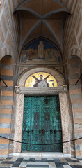 Fototapeta na wymiar Portal of the mediaeval Saint Andrew cathedral in Amalfi