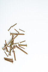 Steel wood screws isolated on a white background with space for copy