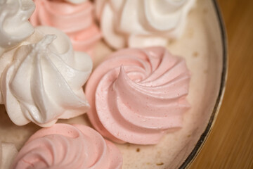 Homemade handmade marshmallow white pink fresh bakery tasty sweet snack natural food closeup clay plate wooden table