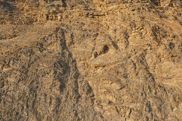Texture of the rock wall of the quarry after limestone mining. 