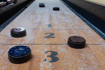 Table Shuffleboard with pucks and salt 