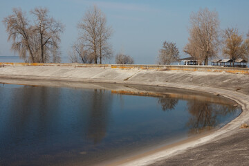 Quiet bay with concrete shores