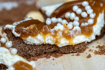 chocolate tartlet with cream filling and salted caramel with nuts