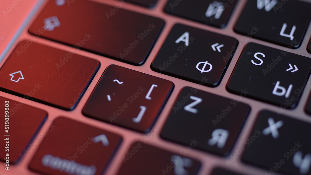 Poster close up of buttons on computer keyboard, macro background. action. black modern laptop buttons unde