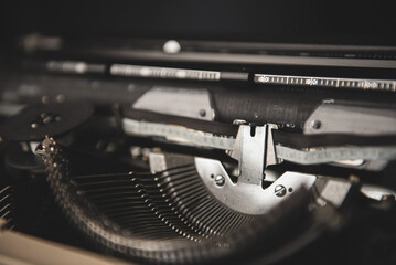 Closeup view of old vintage typewriter with black keys