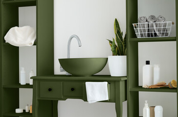 Modern sink and shelf units in interior of bathroom