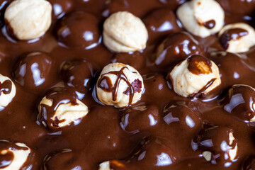 real milk chocolate while cooking with hazelnuts