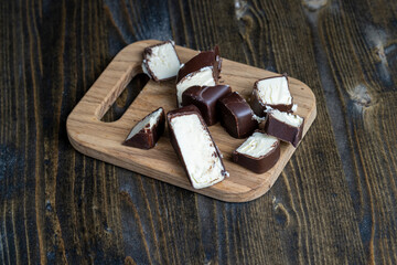 curd cheese in milk chocolate on the table