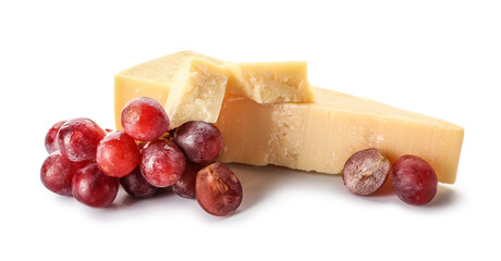 Pieces of tasty Parmesan cheese and grape on white background