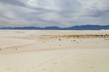 white sands distant mountains