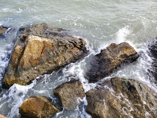 waves on rocks