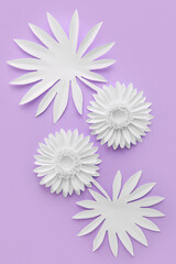 Fototapeta premium Composition with different origami flowers on color background