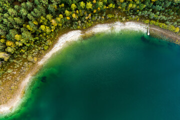 Aerial top down view of beautiful green waters of lake Gela. Clouds reflecting in Gela lake, near Vilnius city, Lithuania