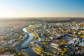 Beautiful Vilnius city panorama in autumn with orange and yellow foliage. Fall city scenery in Vilnius, Lithuania