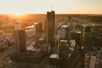 Beautiful aerial evening view of Vilnius business district with scenic sunset illumination.