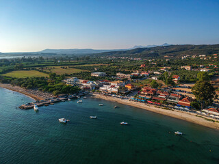Fototapeta na wymiar Panoramic aerial view over Gialova seaside city in Navarino bay. It is one of the best touristic places located in Messenia, Greece.