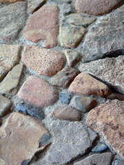 Textured background of red and grey stones abstract