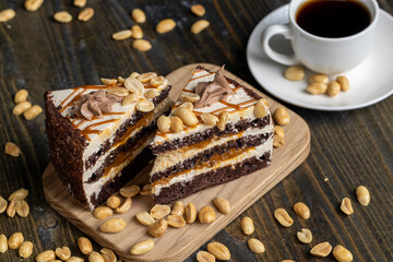 caramel cake with peanuts and buttercream, close up