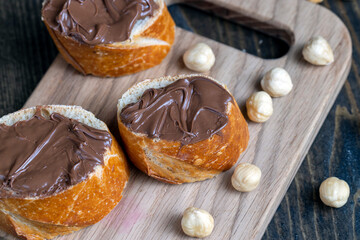chocolate butter spread on a baguette, close up