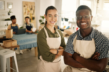 Fashion, design and style with diverse designers and professional team members with arms crossed...