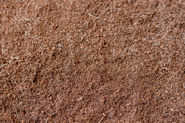 Coconut cocopeat husk chips surface background