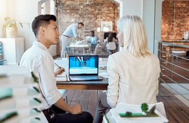 Serious, creative and interior designer showing a customer the building design on laptop writing ideas in notebook. Young business man, project manager and professional architect in a modern office