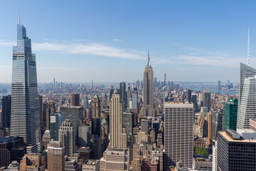 Fototapeta na wymiar Sunny daytime cityscape skyline view of skyscrapers on Manhattan Island in New York City, New York, USA