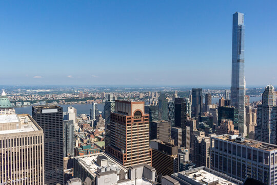 Sunny daytime cityscape skyline view of skyscrapers on Manhattan Island in New York City, New York, USA