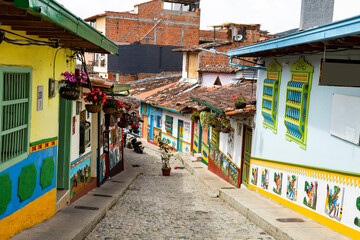 Fototapeta na wymiar Guatape, Antioquia / Colombia - May 25, 2022. Tourist municipality of Colombia and eastern Antioquia. It is famous for its houses decorated with colored bas-reliefs.