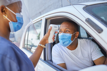 Drive thru for covid screening or testing service for people driving or traveling. Black man...