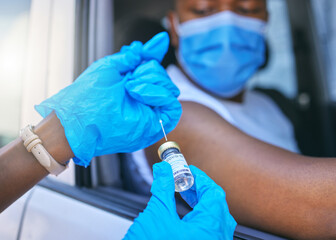 Covid, medical worker and vaccine site and service for patient getting flu shot or dose for coronavirus prevention. Man in car with face mask to avoid contact while getting injection - obrazy, fototapety, plakaty