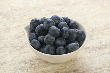 Sweet ripe blueberry heap in the bowl