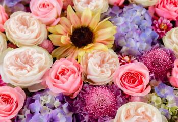 Close-up beautiful bouquet of mixed flowers. Floral Backgrounds in Gentle Colors