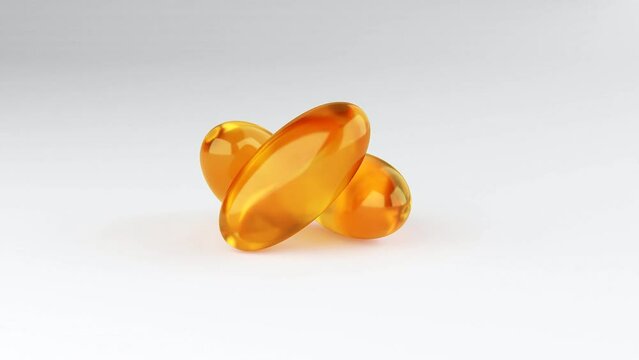 Soft gelatin capsules for containing oily drugs and nutritional supplements like vitamin A, and E. 3D rendering motion. Falling Omega-3 fish oil liquid gel capsules falling over white background