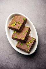 chocolate barfi or choco burfi cake, a tweak to indian dessert or sweet for festivals