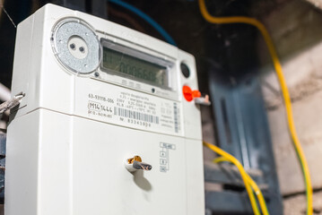 Smart electric power meter counter measuring power usage.Close-up of modern smart grid residential...
