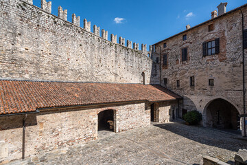 Naklejka premium Courtyard of Rocca Borromea di Angera, a medieval castle on the shores of Lake Maggiore, Lombardy, Italy