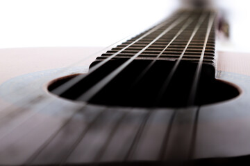 Fototapeta premium classical guitar strings and frets on white background