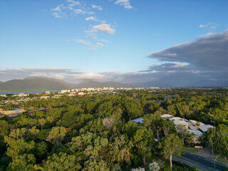 Aerial view of Cairns botanical garden and mountains at sunset
