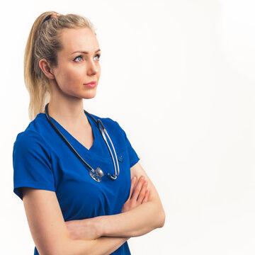 a blonde female doctor thinking out - closeup isolated. High quality photo