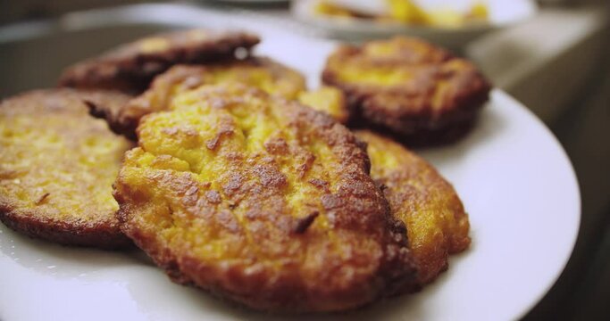 Close-up of Tortas De Choclo or Rega&ntilde;onas on a plate.