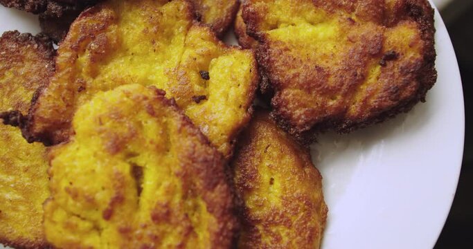 Super close-up of Tortas De Choclo or Rega&ntilde;onas on a plate.