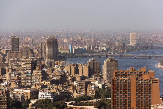 Sprawling megacity, concrete jungle of Cairo Egypt with the river Nile