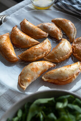 Dumplings stuffed with tuna, tomato and egg. Spanish or Argentinian style dumplings