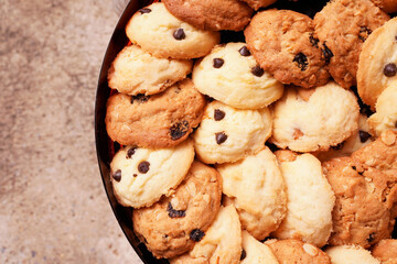 Top view of homemade Cashew nut with Butter and chocolate chip Cookies on concrete background with...