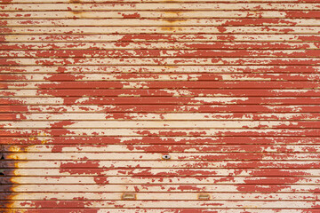 塗装の剥げたシャッターの背景素材