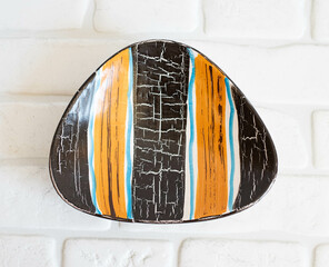 Mid-century modern pottery - wall plate with stripes