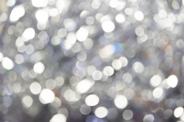 Shiny blurred background with Christmas decorations. Soft focus