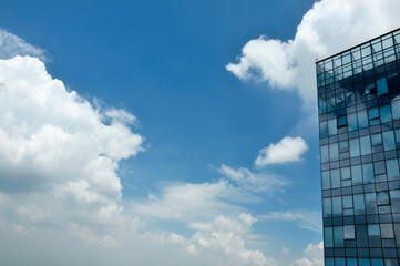 Fototapeta na wymiar office building with clouds